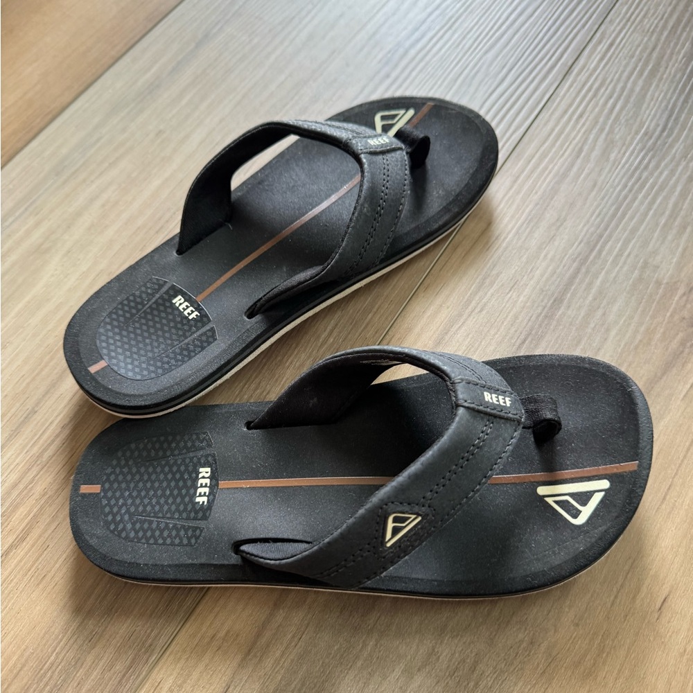 Reef Black Sandals with Textured Footbed and Durable Sole